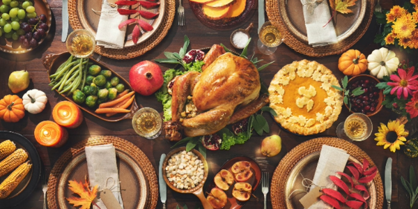 A table full of holiday dishes and treats.