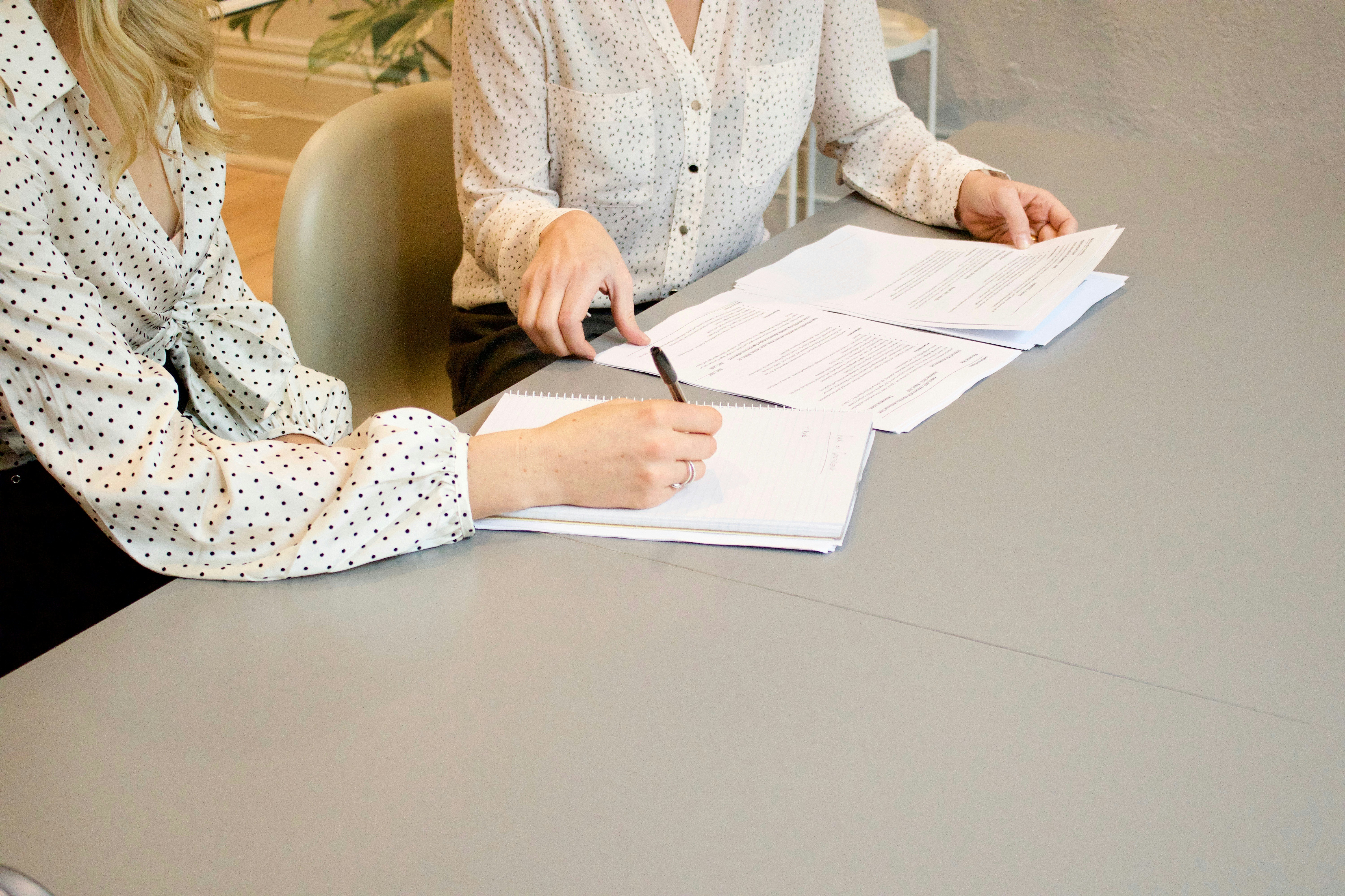 People at desk in a meeting