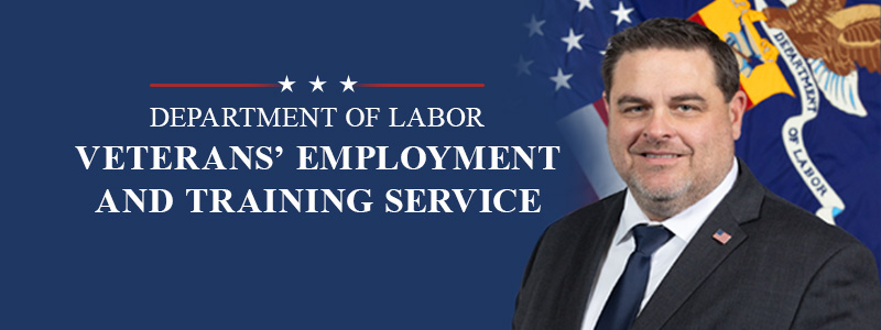 Veterans' Employment and Training Service. Official photo shows a white man in a suite in front of the Labor Department flag.
