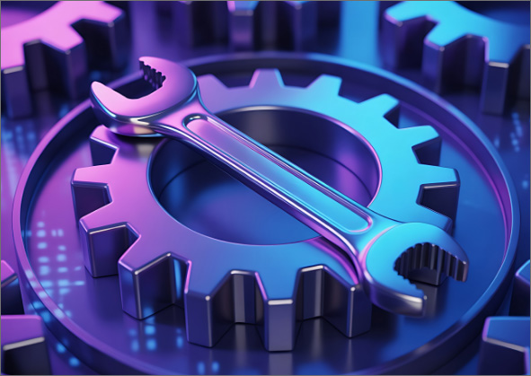 An open-ended wrench on top of a gear.