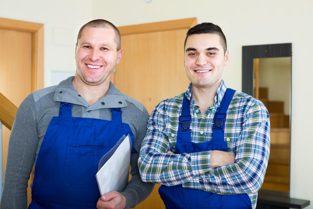 two men standing side by side