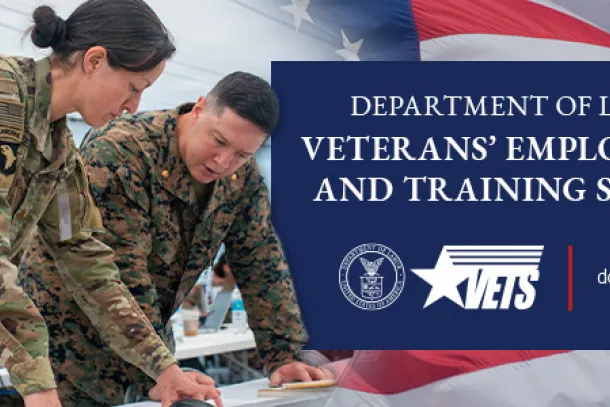 Two military service members in uniform are working together at a table. The American flag is behind the blue rectangle with words. The words on the blue rectangle say Department of Labor Veterans Employment and Training Service, the department’s logo and dol.gov/vets are below.