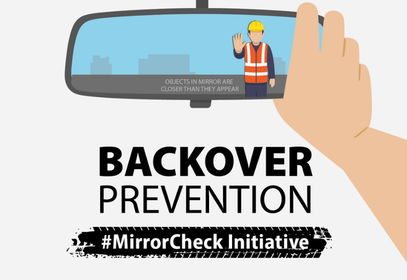 Illustrated graphic of someone looking in a rear view mirror, which shows a construction worker behind the vehicle making a "stop motion" with their hand. The mirror says "objects in mirror are closer than they appear." The graphic text says "Backover prevention, #MirrorCheck Initiative."