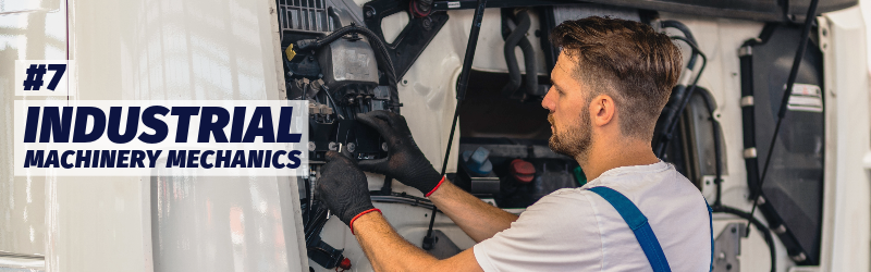 A man wearing overalls and work gloves looks at a panel under the hood of a large truck. "Number seven: Industrial machinery mechanics."