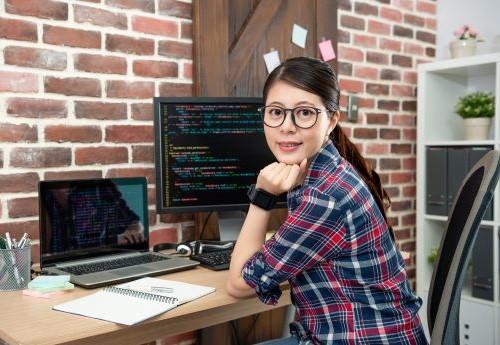 Woman sitting at a computer