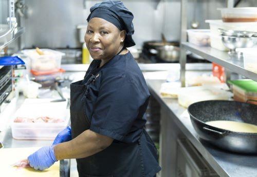 woman working as a chef in a restaurant
