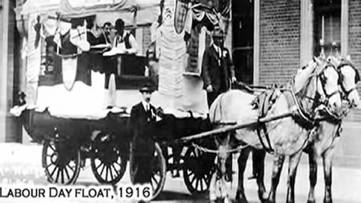 A postcard shows a horse-drawn float. The caption reads: Labour Day Float, 1916.