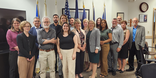 Diego Low (fourth from left) with other worker advocates and Wage and Hour Division staff