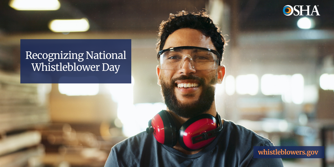 A male worker who is wearing safety glasses and ear protection stands in a warehouse. "Recognizing National Whistleblower Day. whistleblowers.gov"