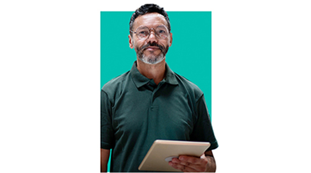 Man in black shirt holding a book